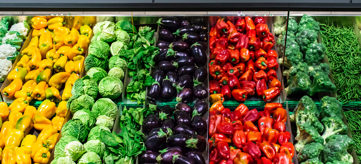 Vegetables On Shelf In Supermarket.